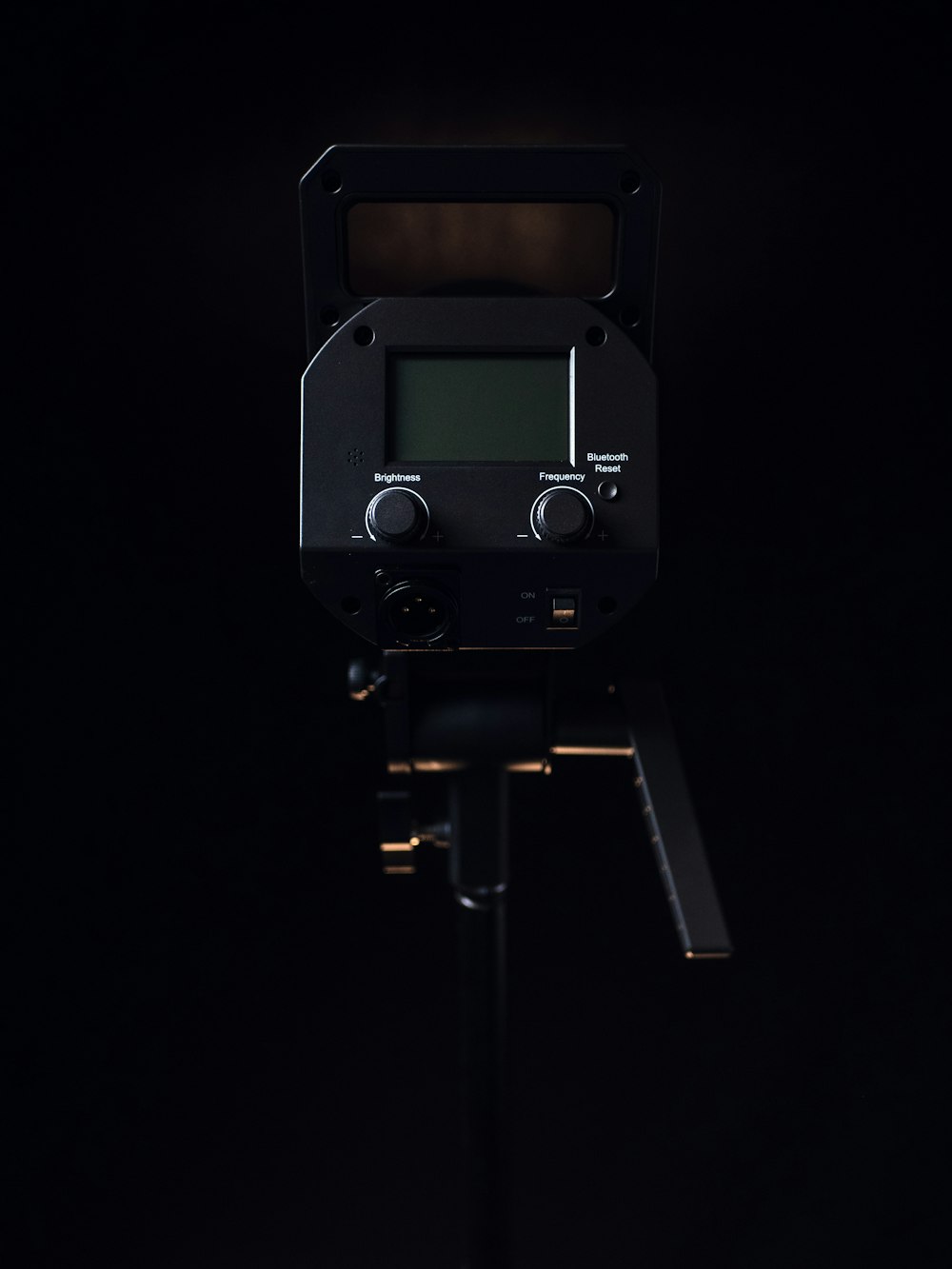 a close up of a camera on a tripod