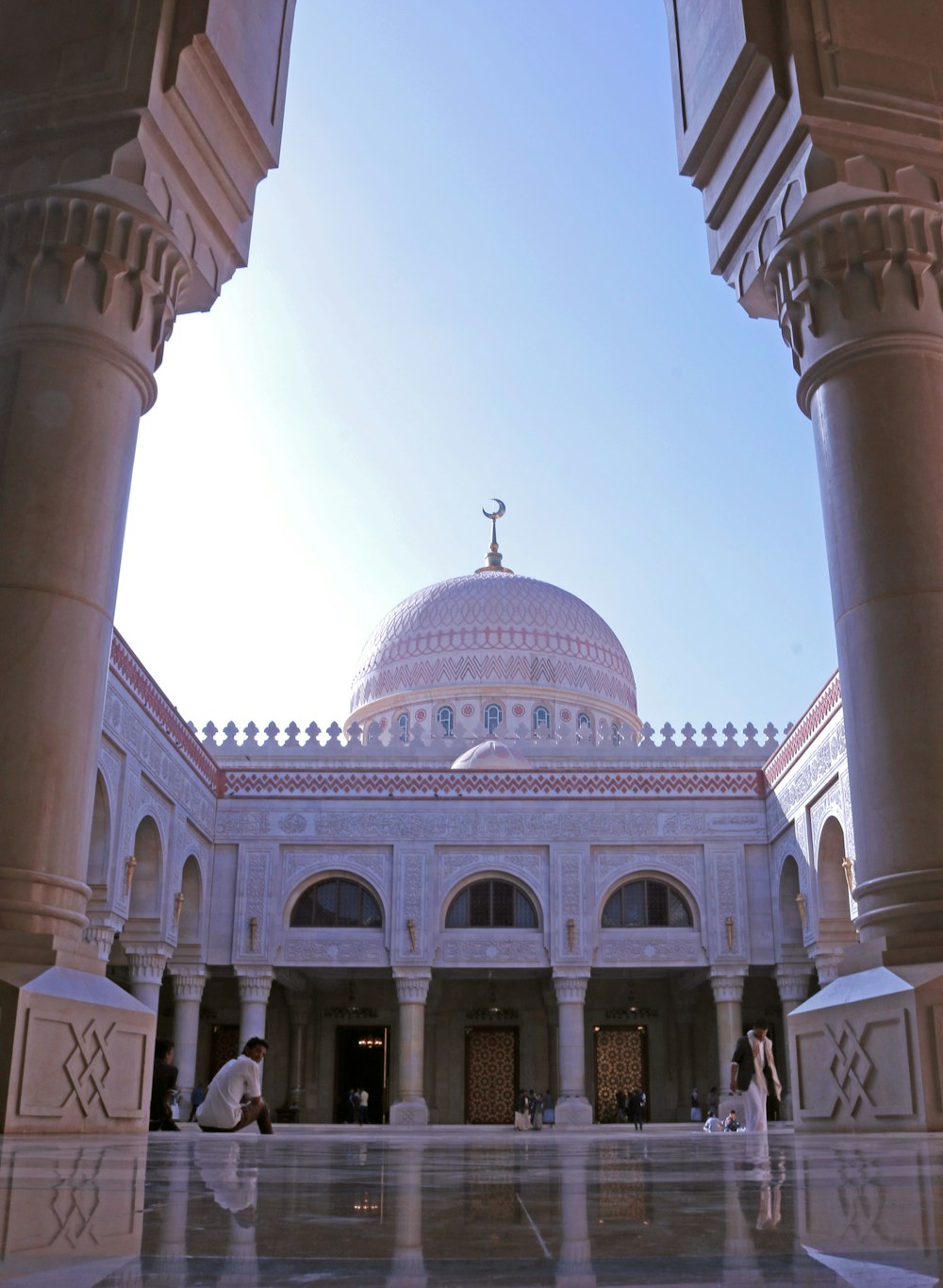 a large white building with a dome on top of it