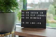 Airport departures board showing flight information
