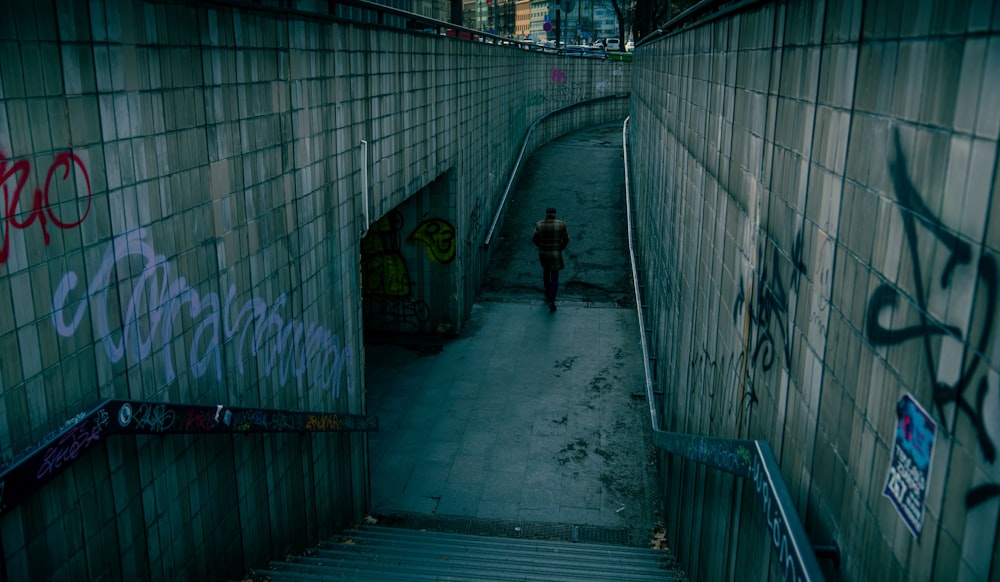 a man walking down a flight of stairs