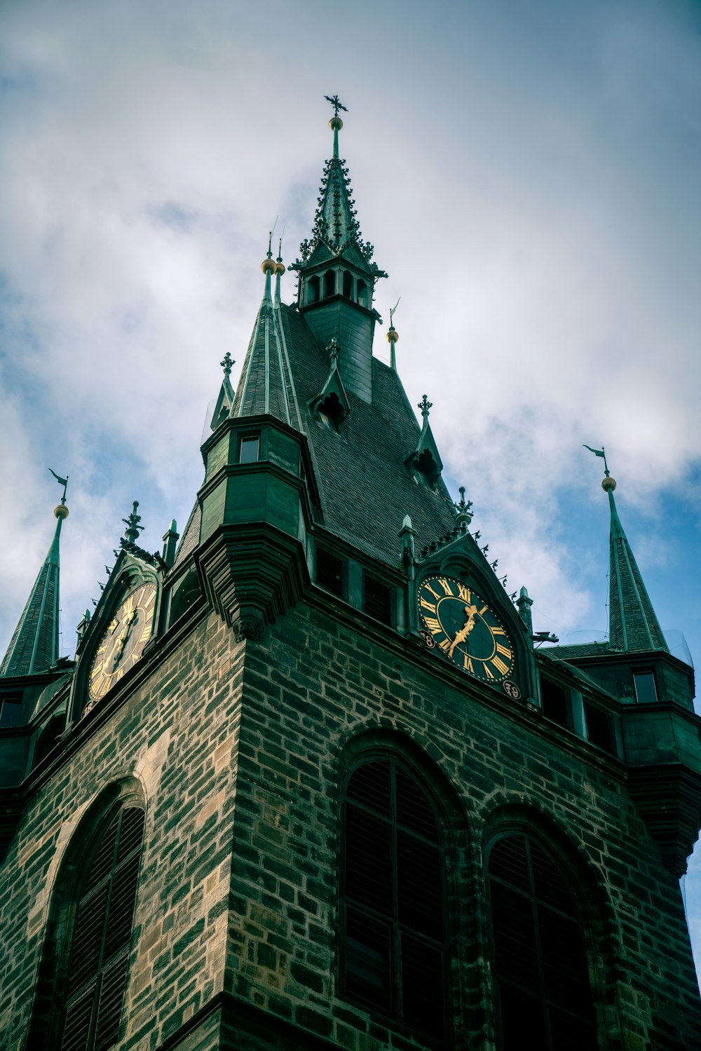 a clock tower with a sky in the background