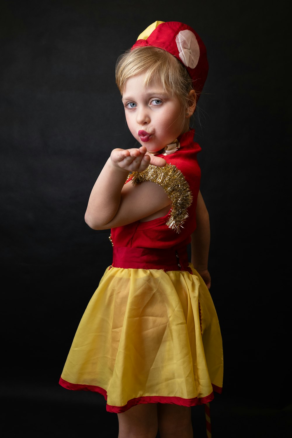 a little girl dressed up like a princess