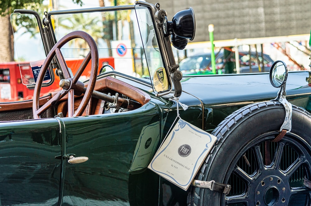 a close up of the front of an old fashioned car