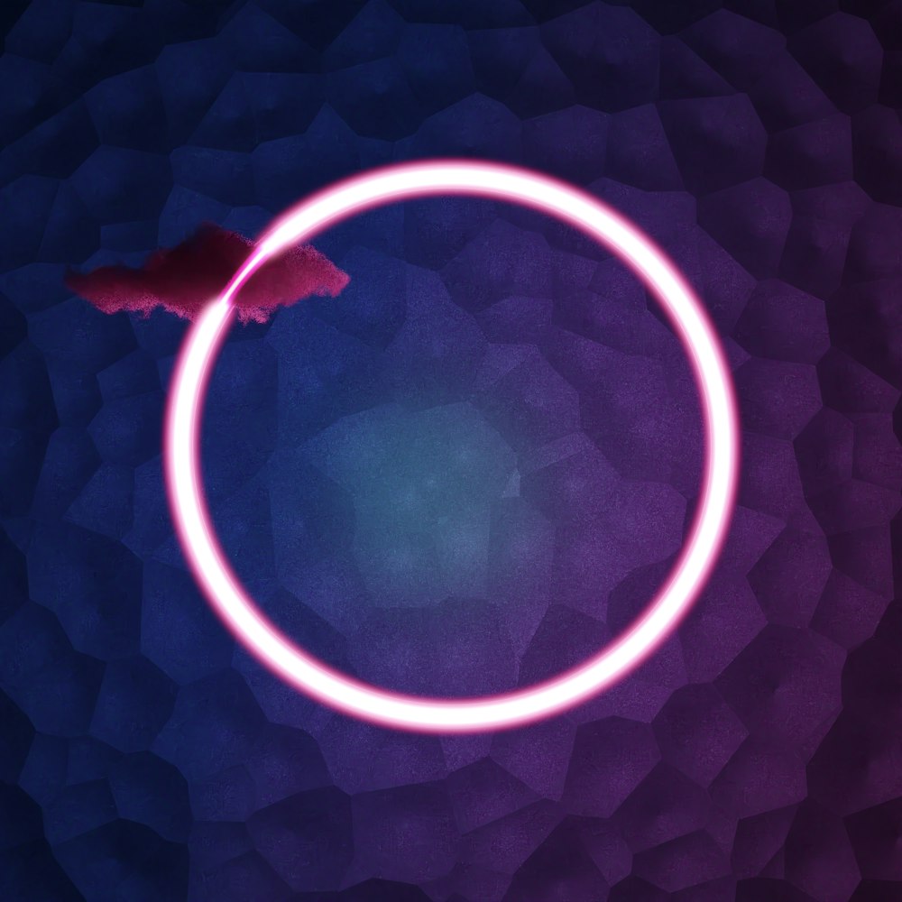 a circular object with a red light in the middle of it