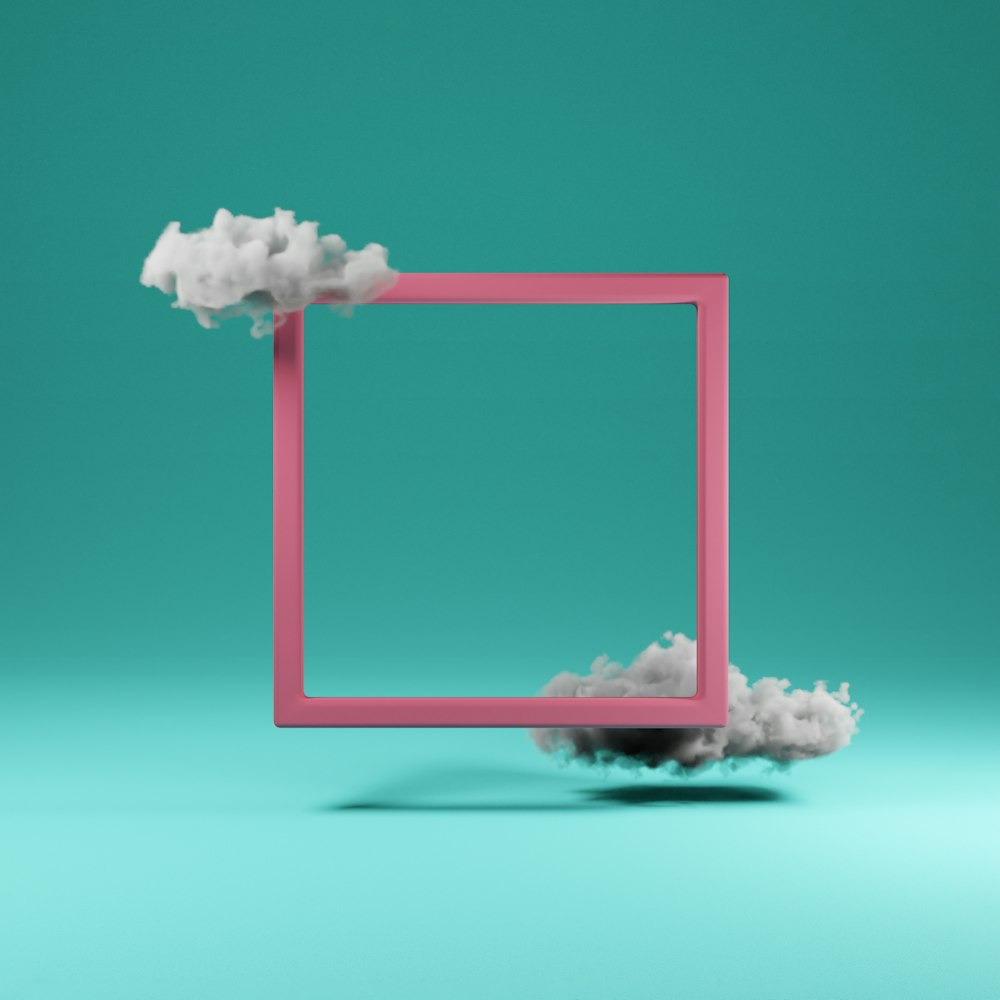 a square frame with clouds floating out of it
