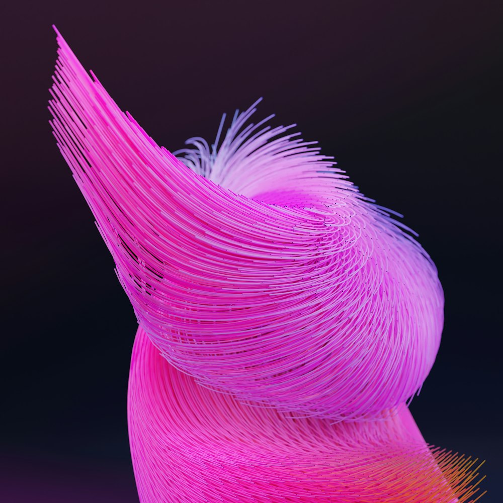 a pink sculpture with a purple background