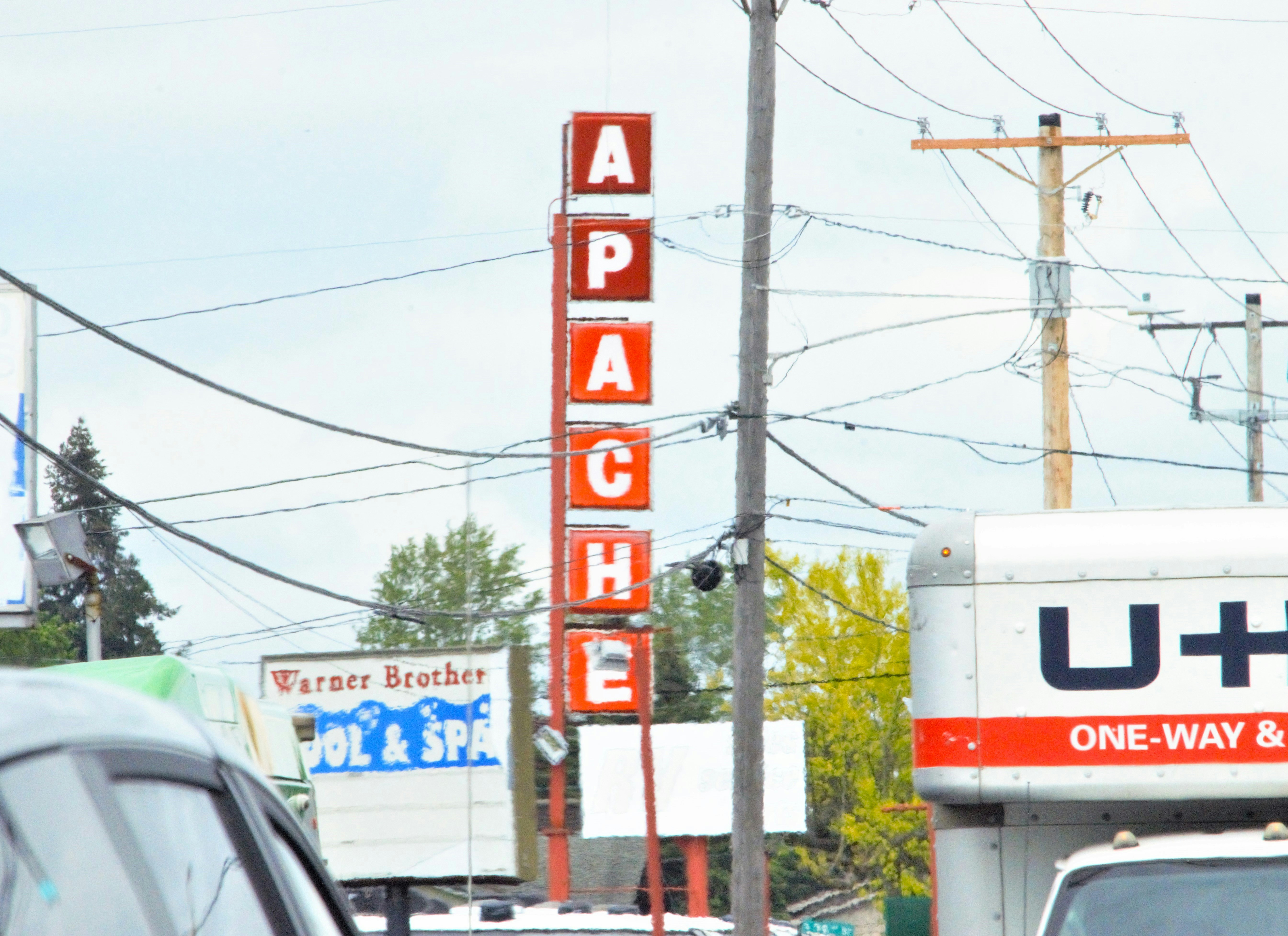 a sign that says papa's on the side of a building