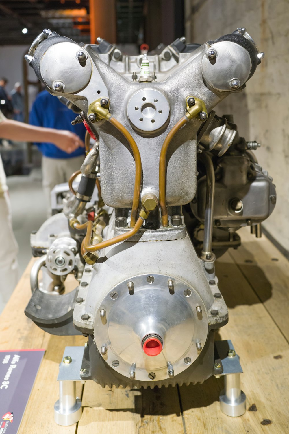 a close up of an engine on a wooden table