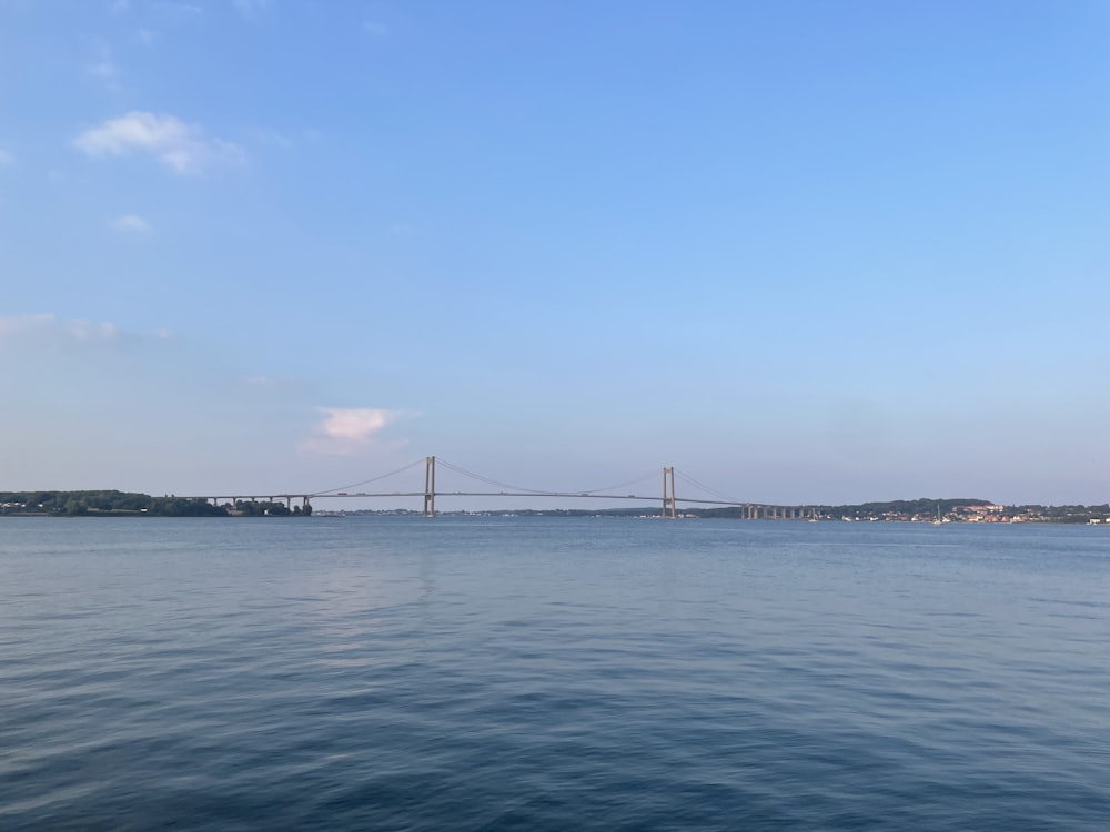 a large bridge spanning over a large body of water