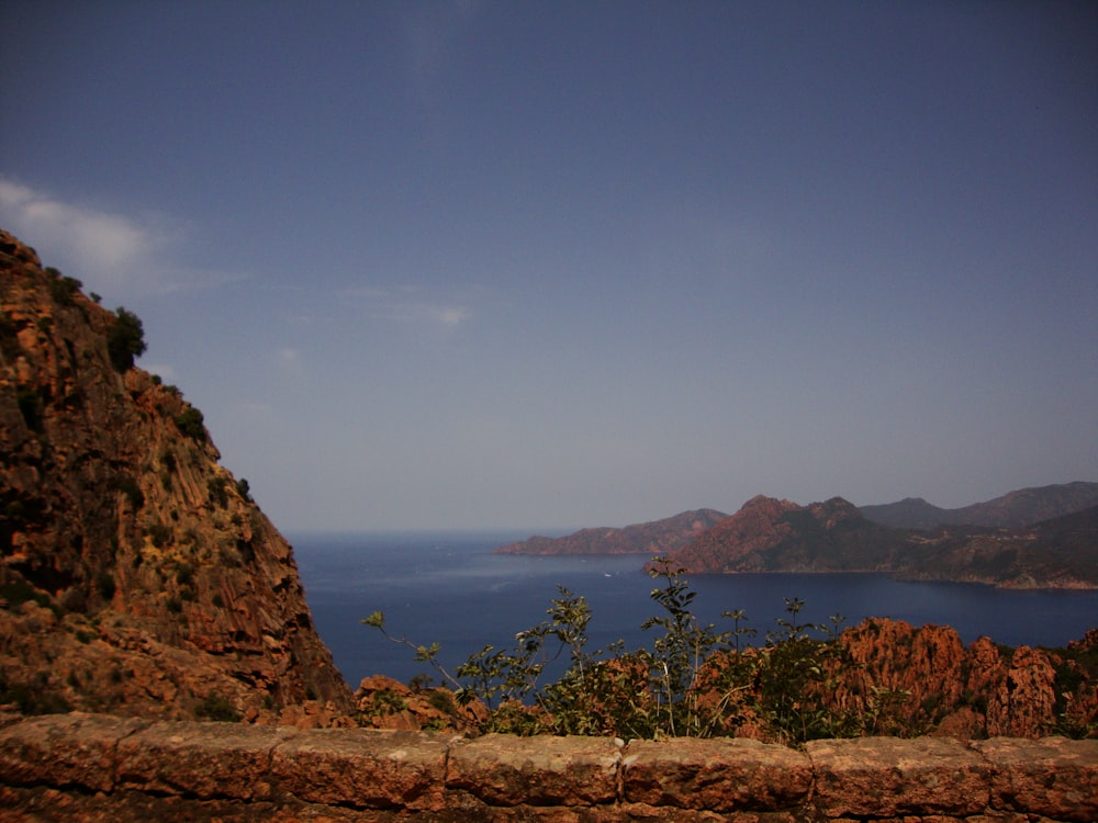 a view of a body of water from a hill