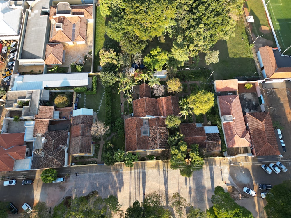 an aerial view of a residential area with lots of trees