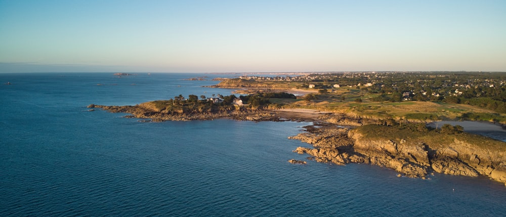 an aerial view of a small island in the middle of the ocean