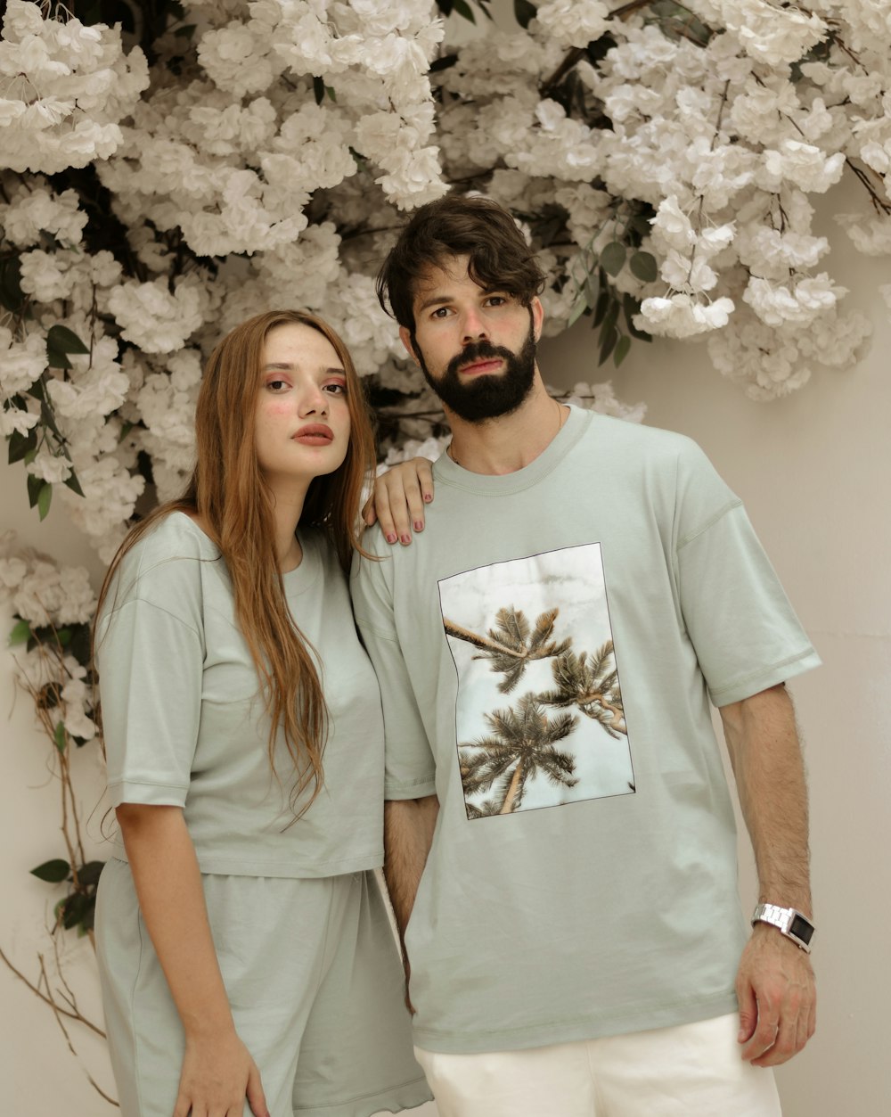 a man and a woman standing next to each other