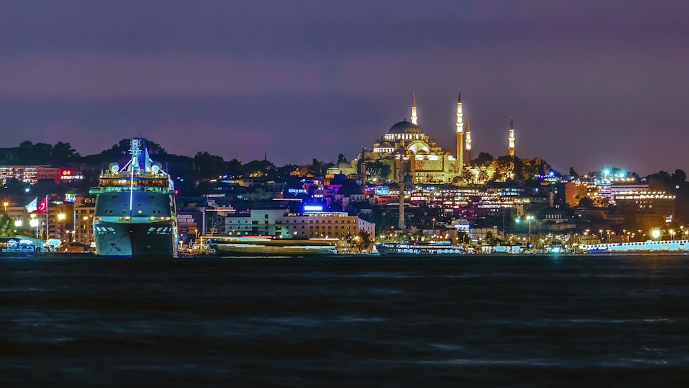 a view of a city at night from across the water