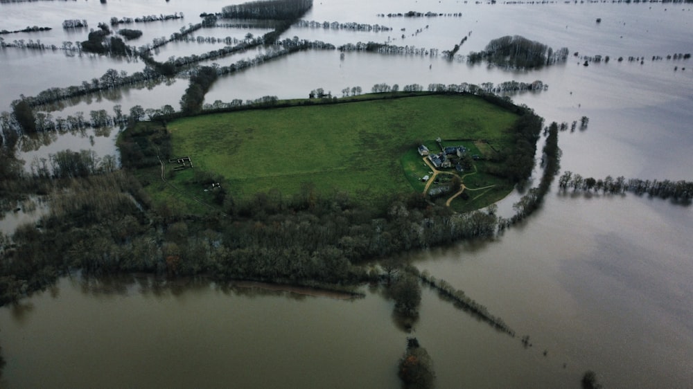 an aerial view of a flooded area of land