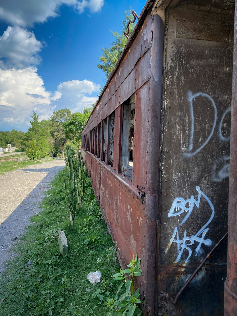 a train car with graffiti on the side of it