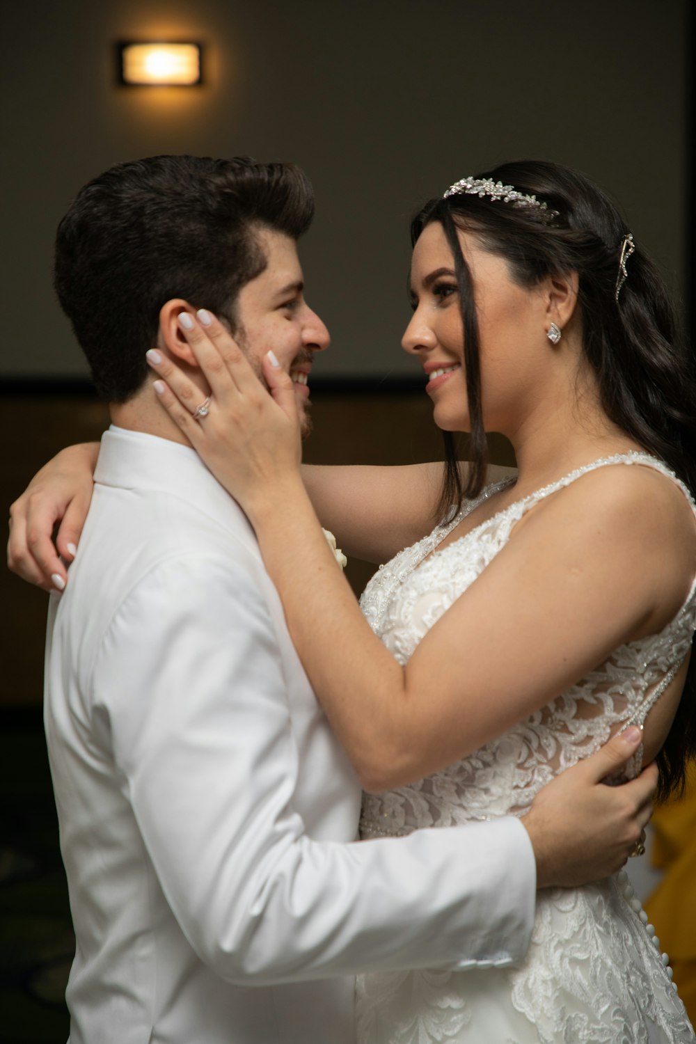 a bride and groom sharing a first dance