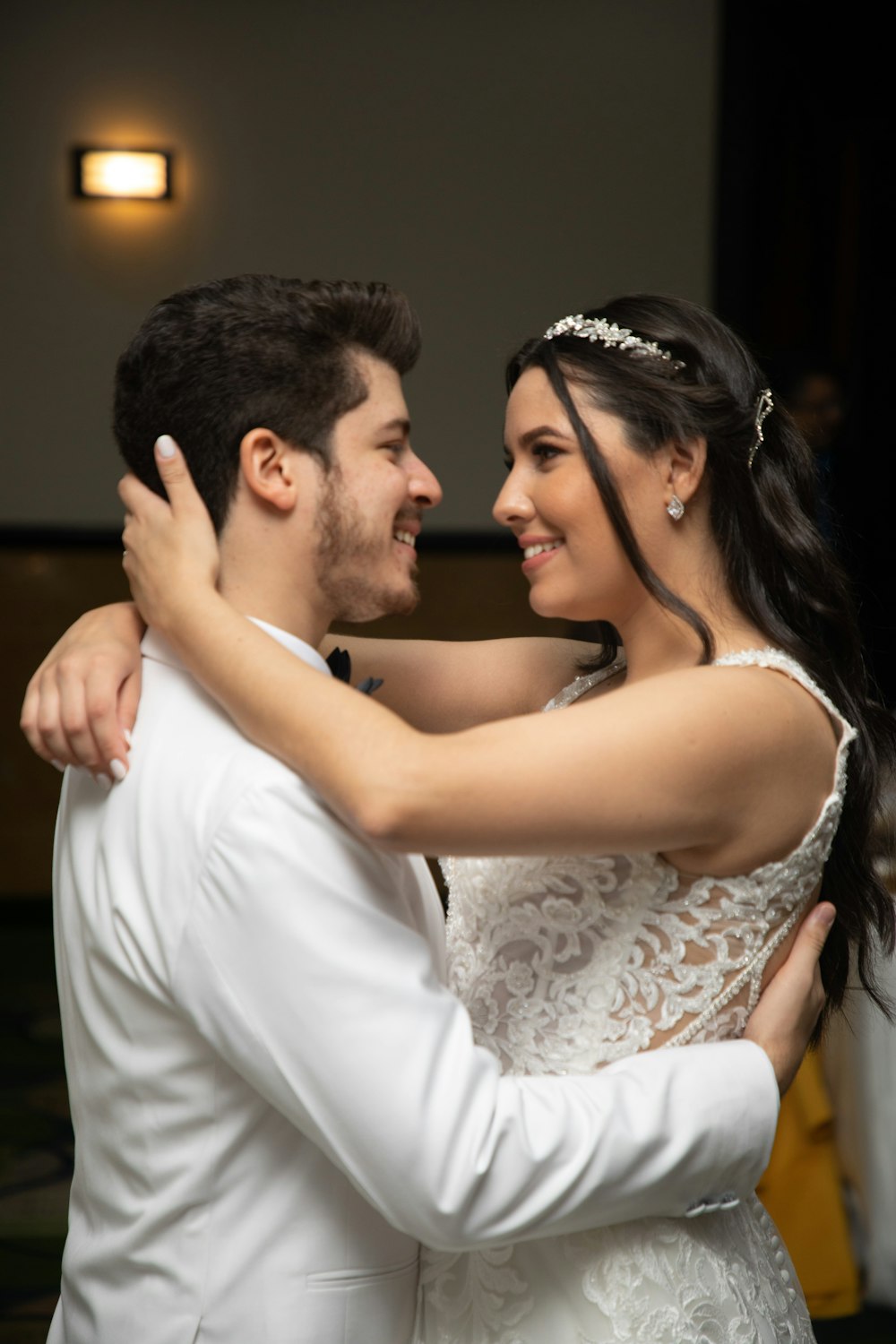 a bride and groom dance together at their wedding reception