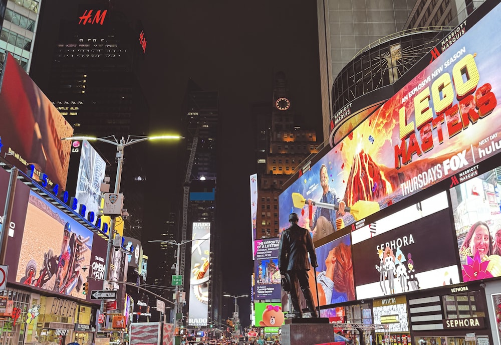 a man standing on a platform in the middle of a city