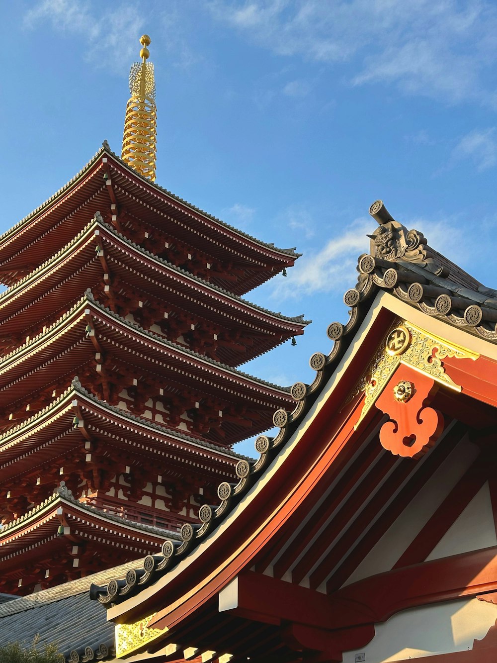 a tall building with a tower in the background