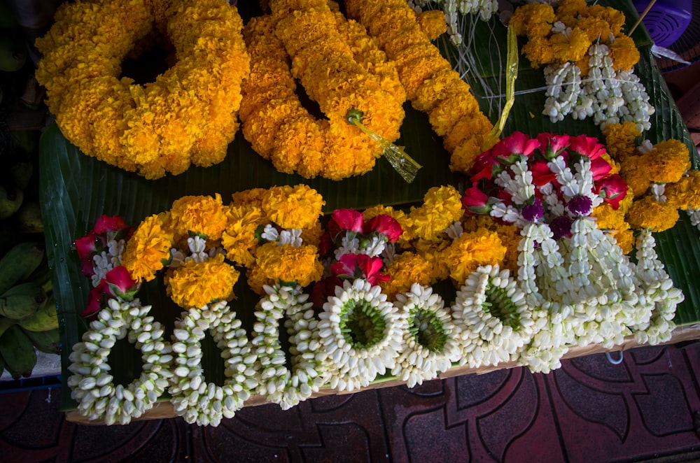 a bunch of flowers that are on a table