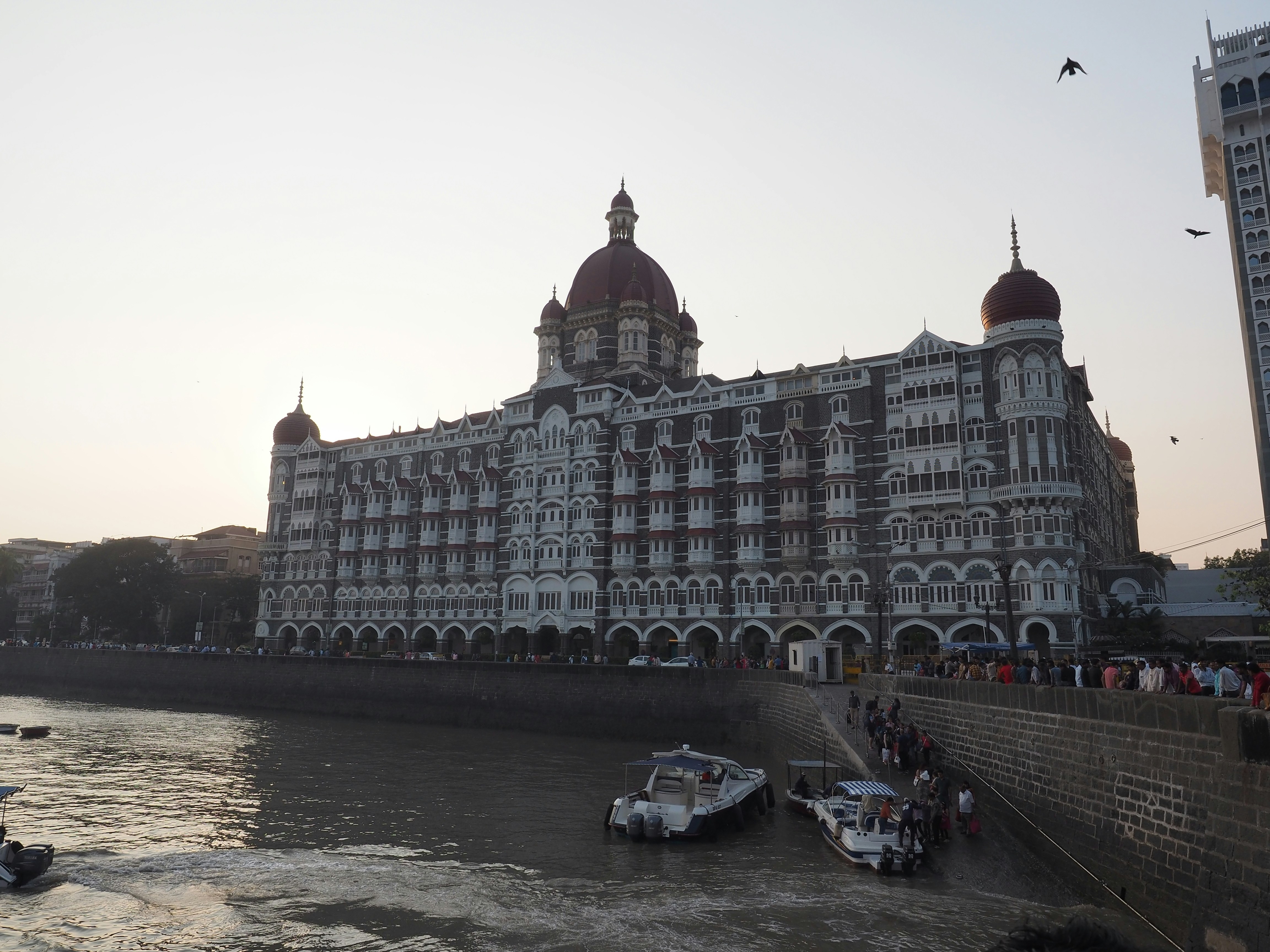 a large building next to a body of water