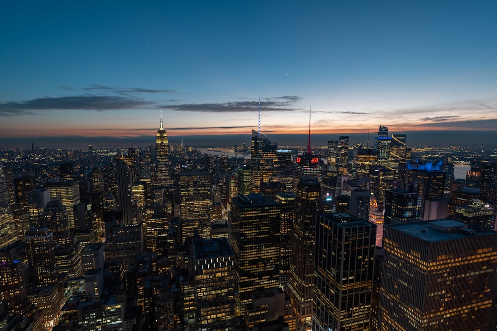 a view of a city at night from the top of a building