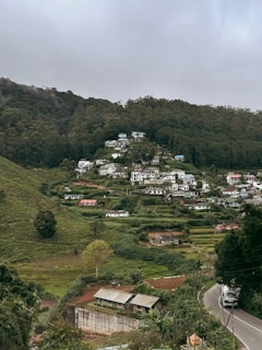 a view of a small town on a hill