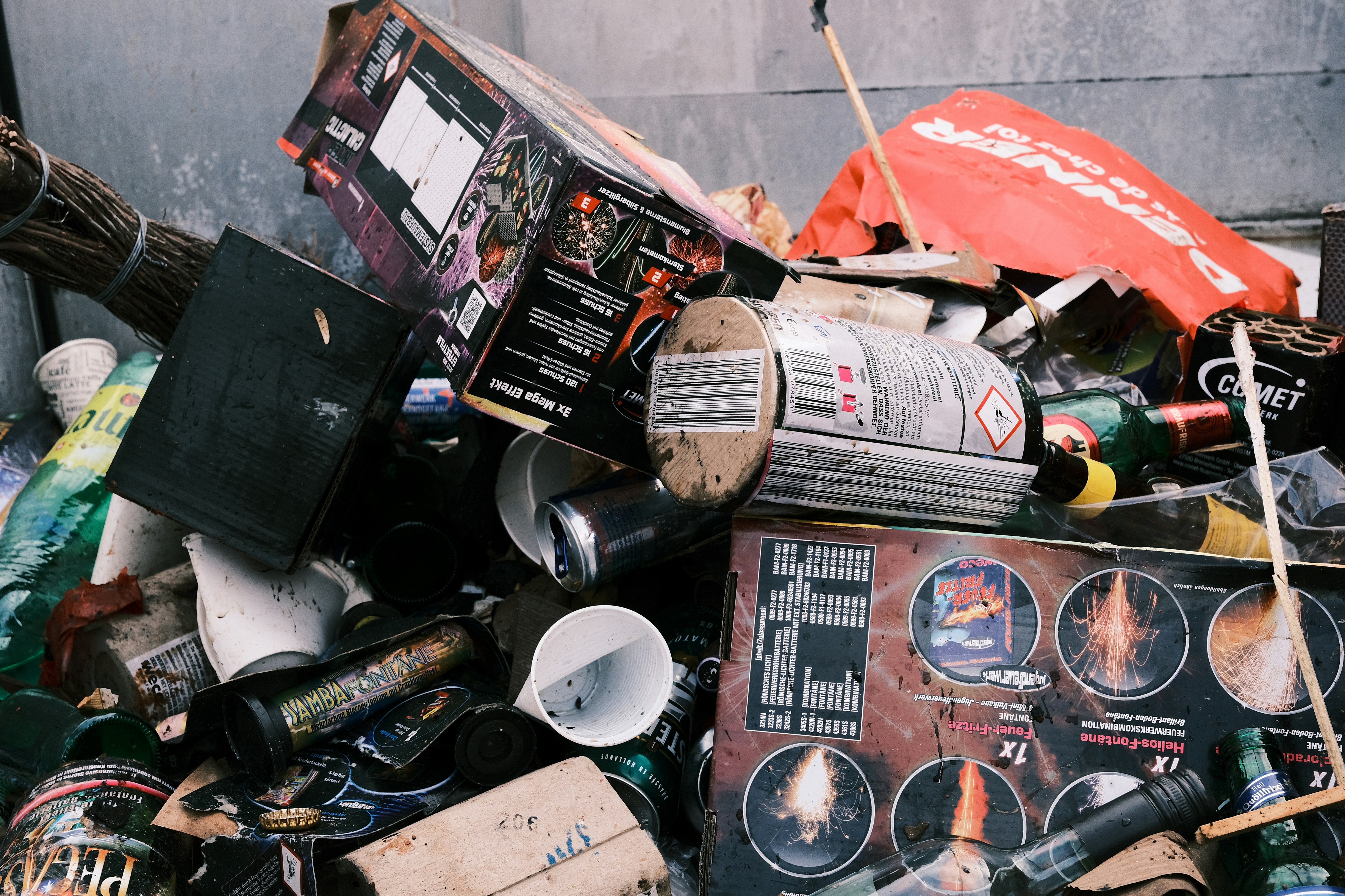a pile of trash sitting next to a building