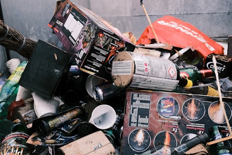 a pile of trash sitting next to a building