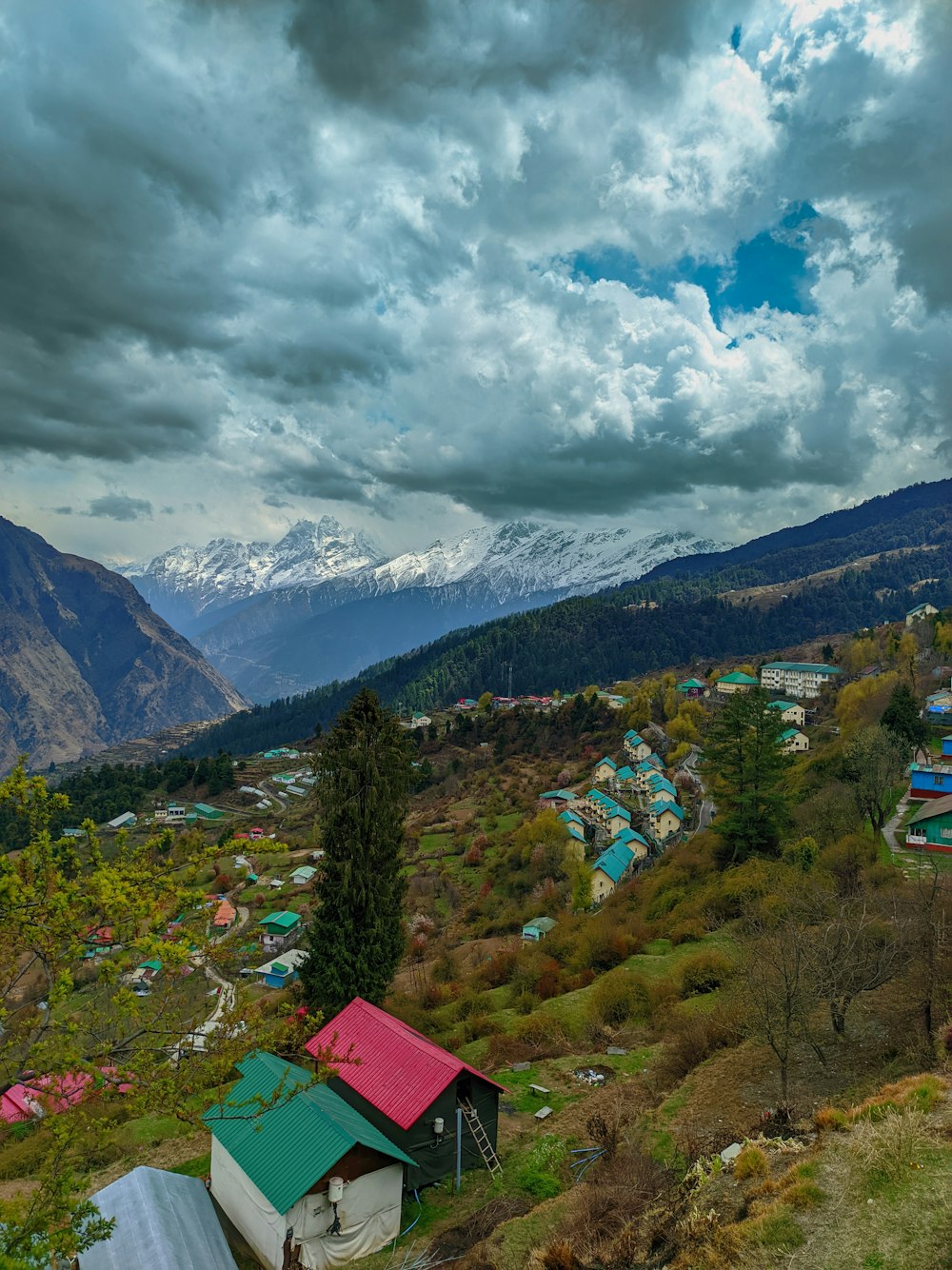 a view of a small village in the mountains