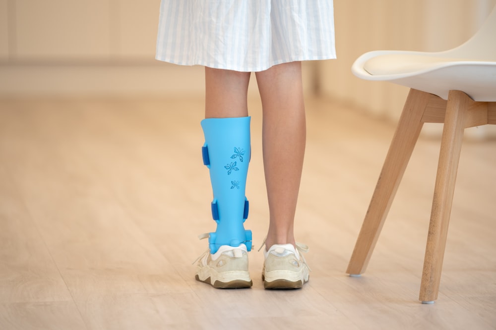 A child wearing a supportive ankle brace