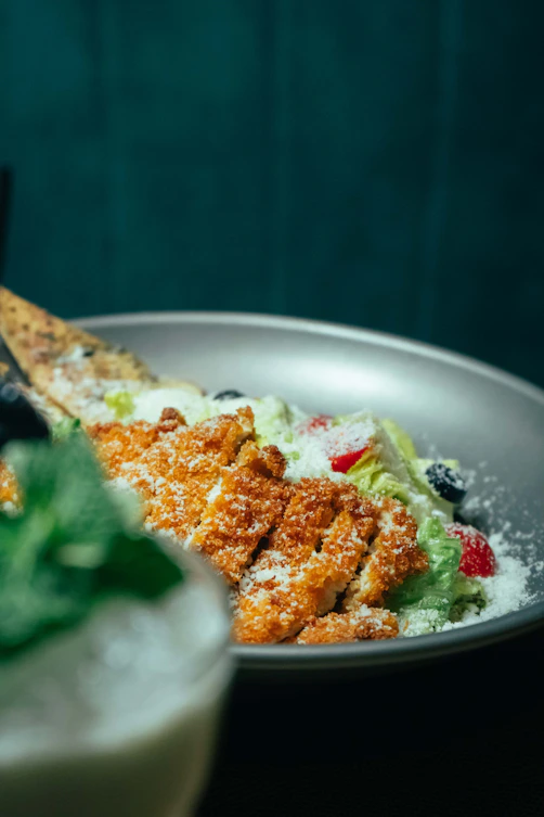 a plate of food with a fork in it