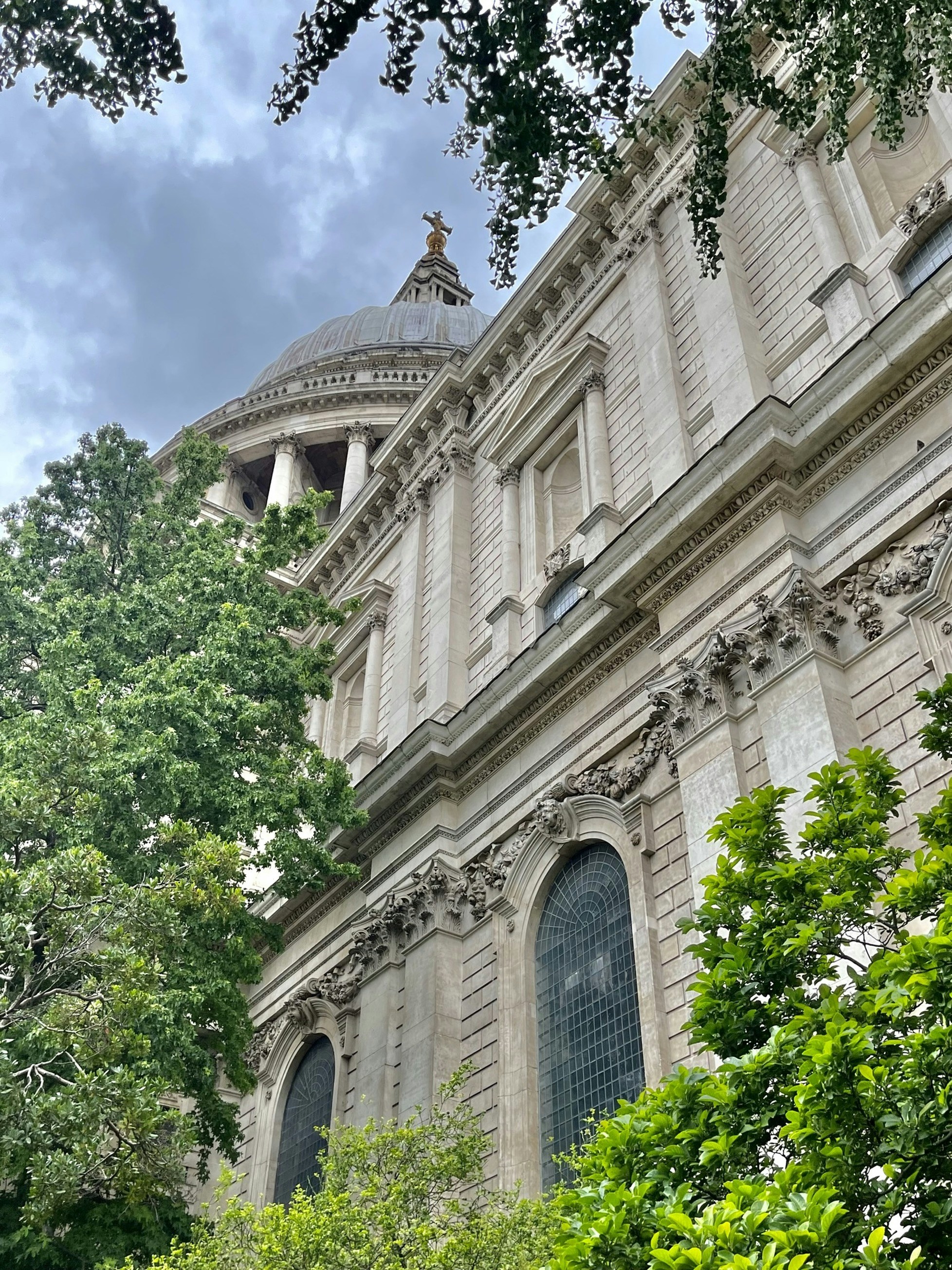 a tall building with a clock on the front of it