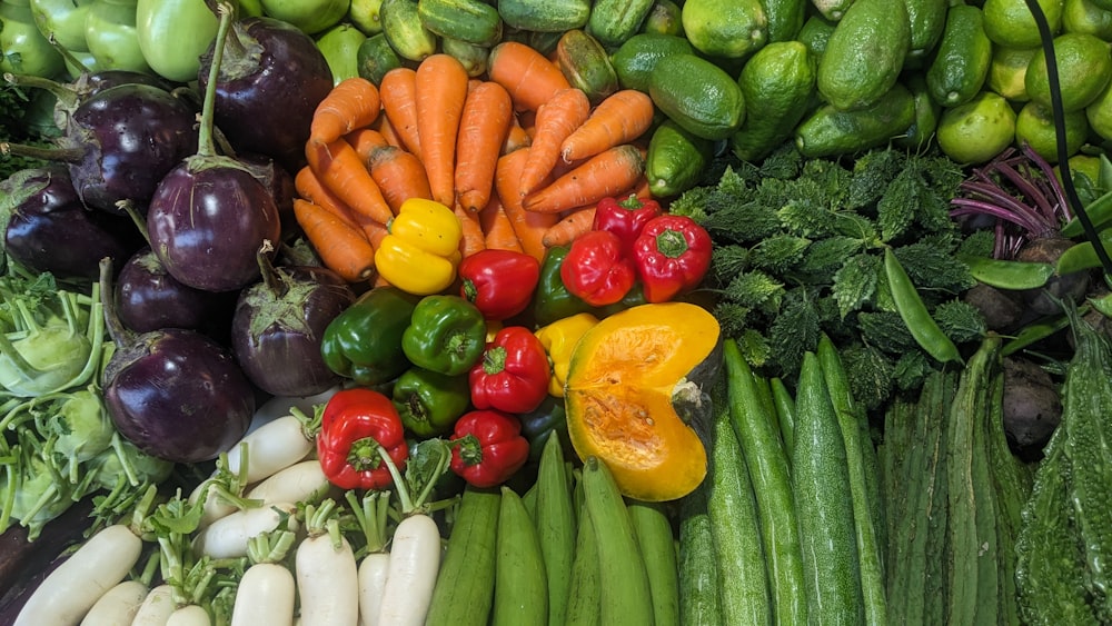 a variety of vegetables are arranged on a table