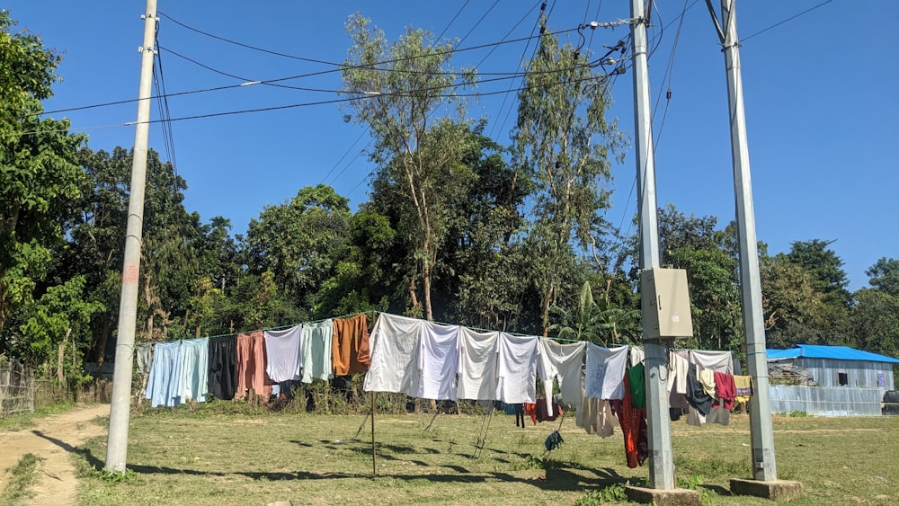 a bunch of clothes hanging out to dry on a line