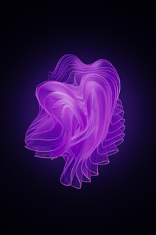 a purple liquid swirl on a black background