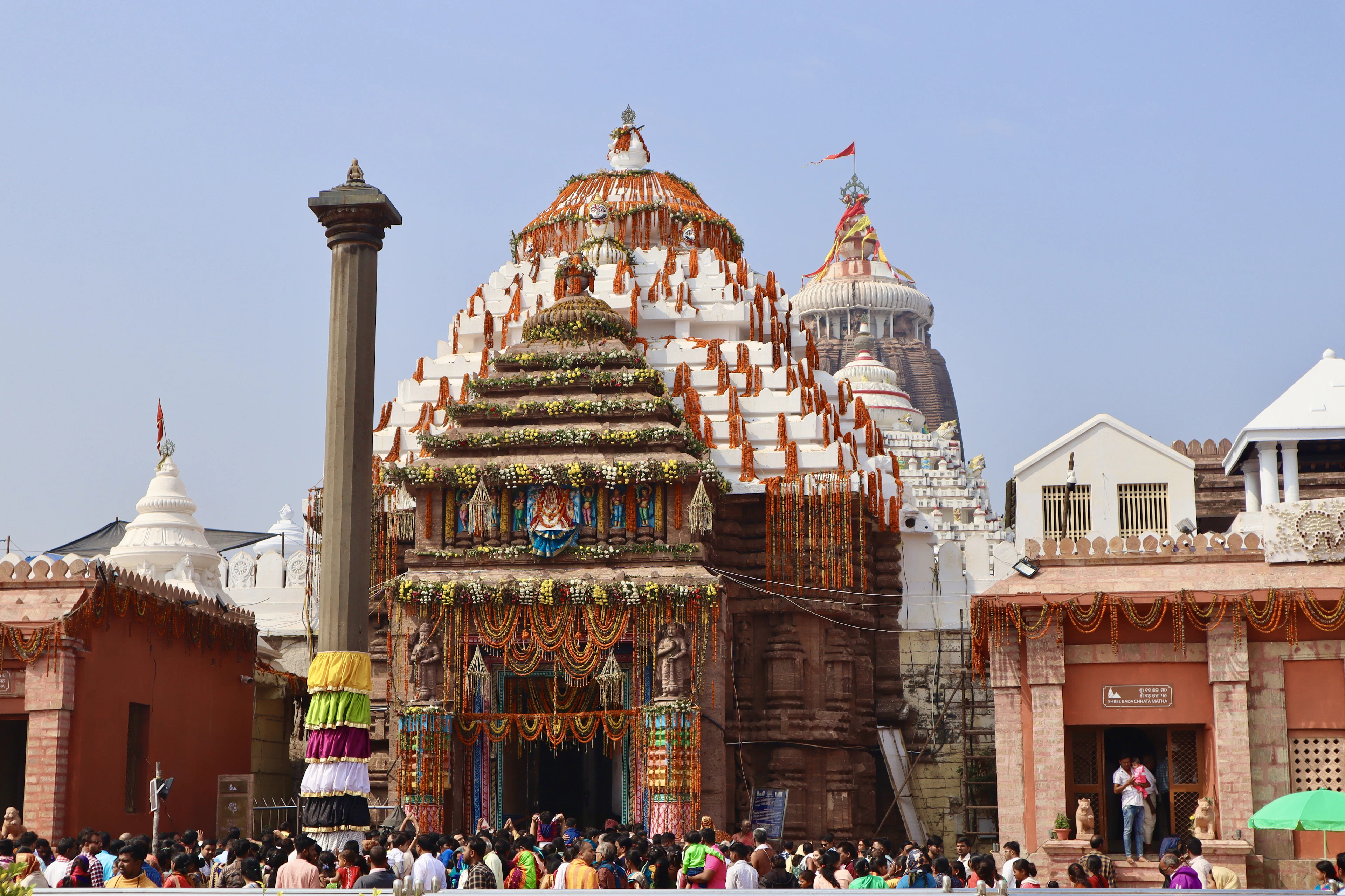 A temple in Odisha decorated with flowers and garlands