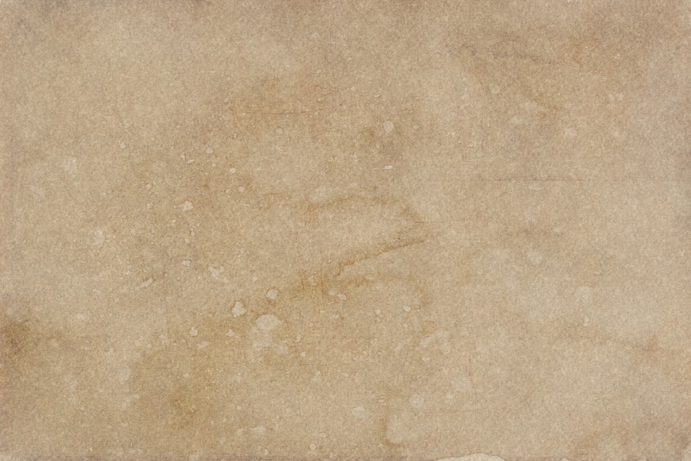 a piece of paper with a brown background