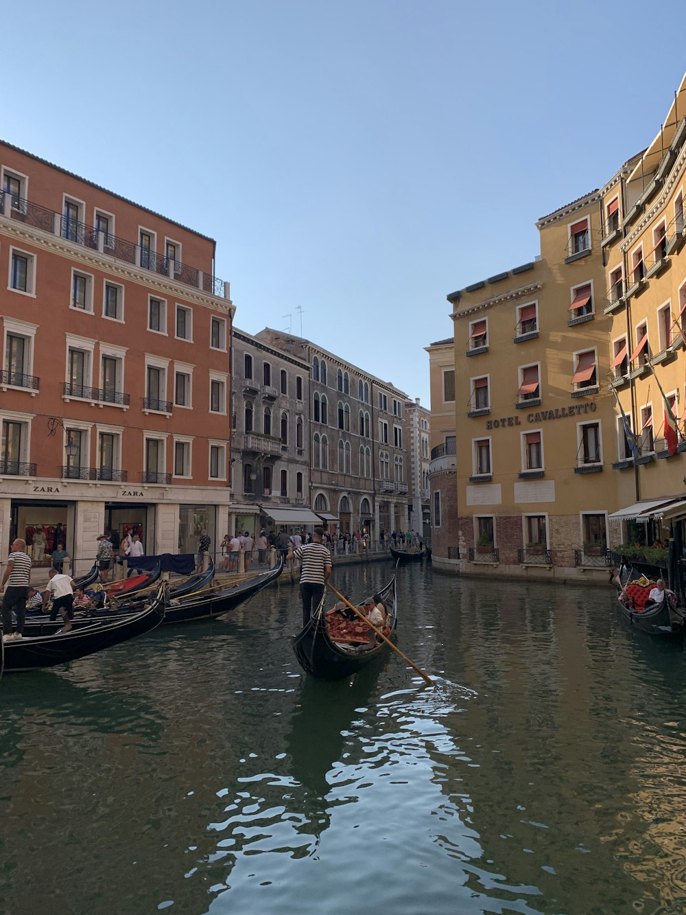 a couple of gondolas that are in the water