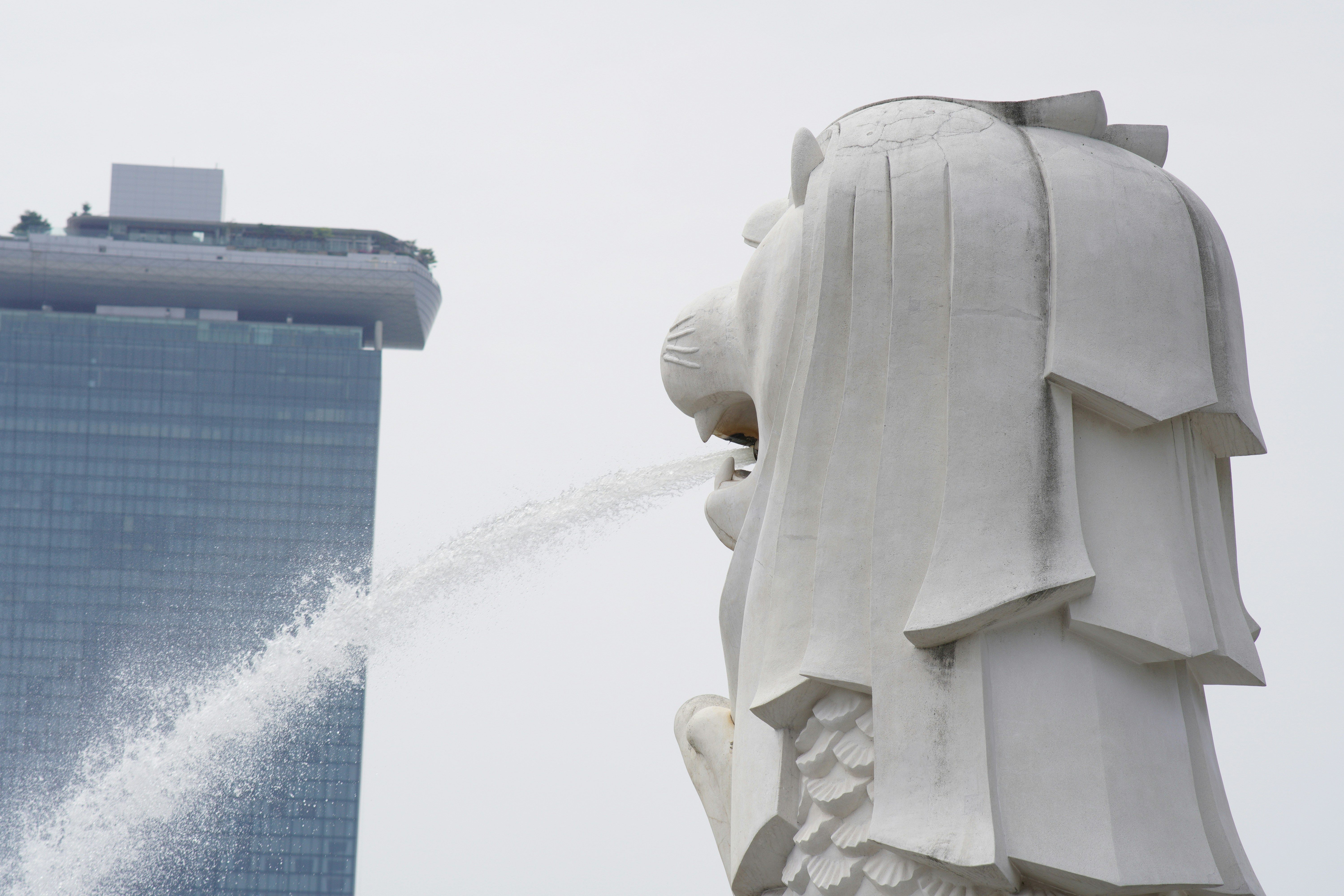 a water spewing out of a statue of liberty