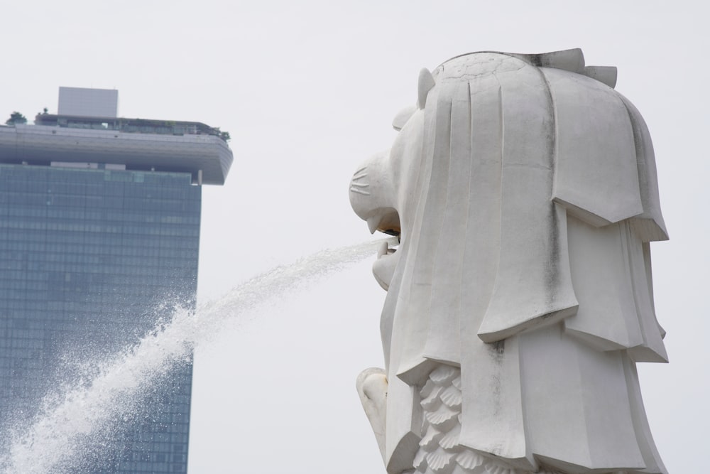 a water spewing out of a statue of liberty