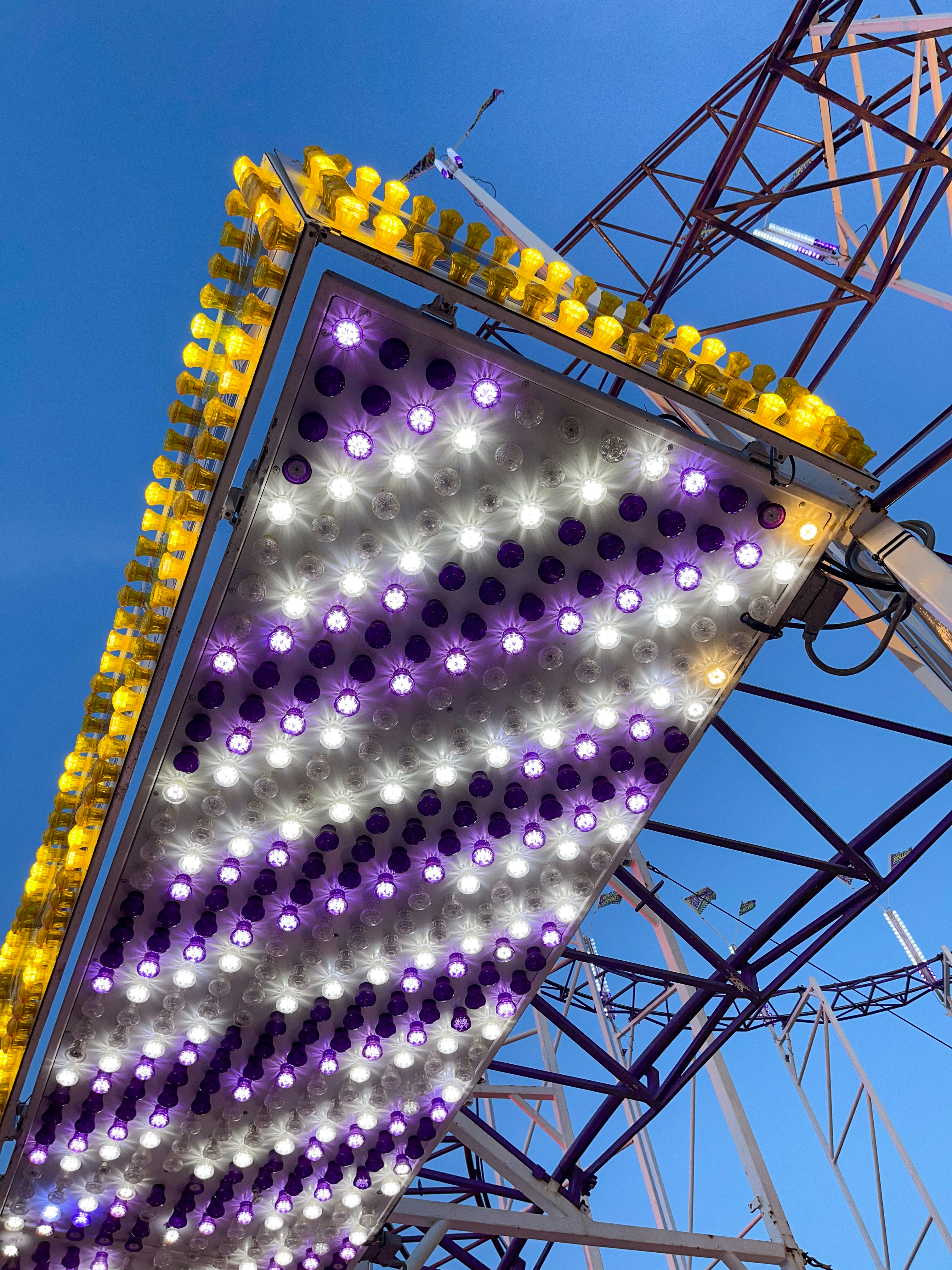 a close up of a sign with lights on it