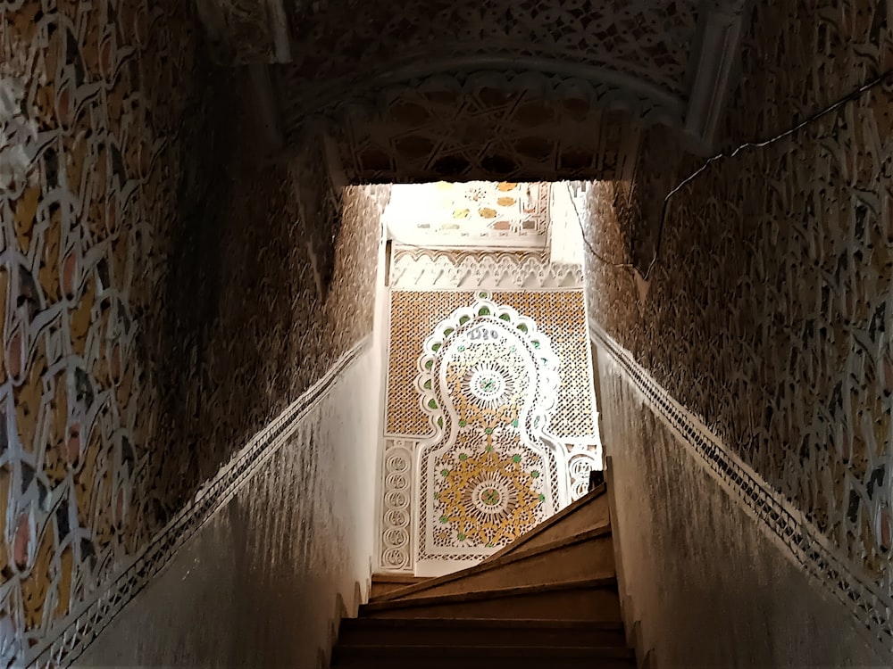 a stair case with a decorative design on it