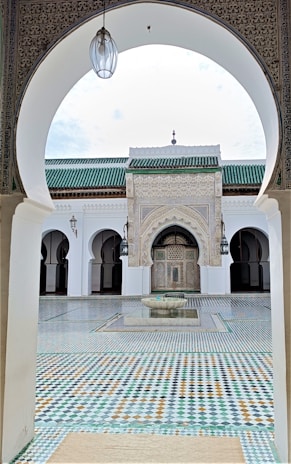 a building with a fountain in the middle of it