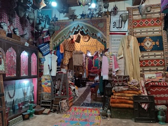 a store with a lot of rugs and rugs on display