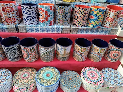 a bunch of cups that are sitting on a table