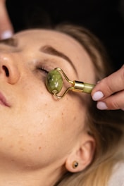 a woman getting a facial peel from a woman's face