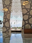a large room with a large wall of windows