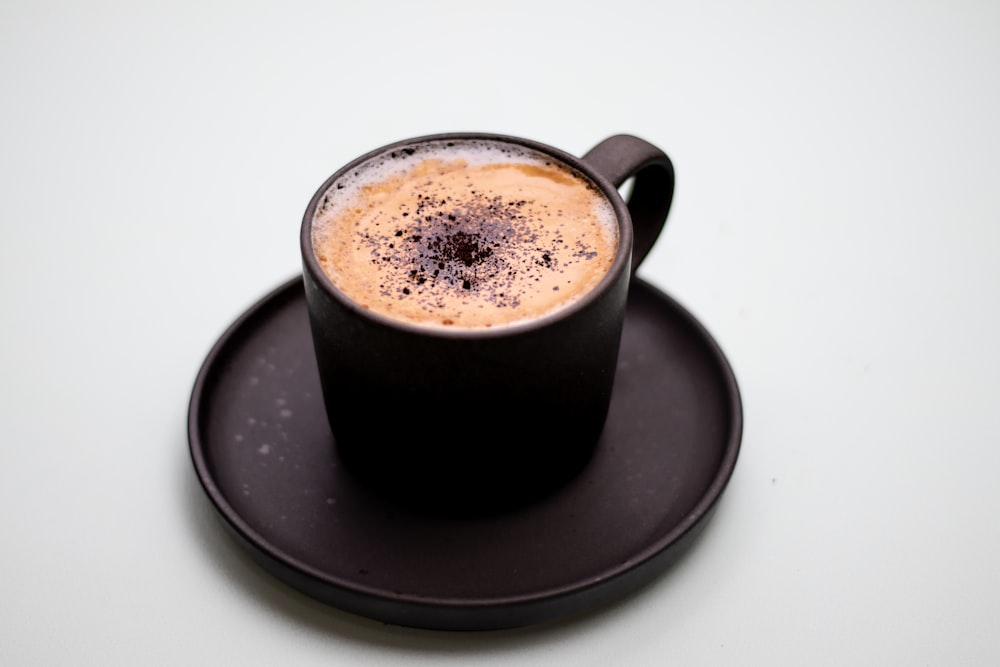 a cup of hot chocolate on a saucer